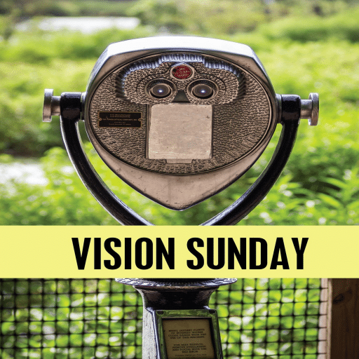A tourist binocular set overlooks a green landscape. On a yellow band across the photo are the words "Vision Sunday" in capital letters.