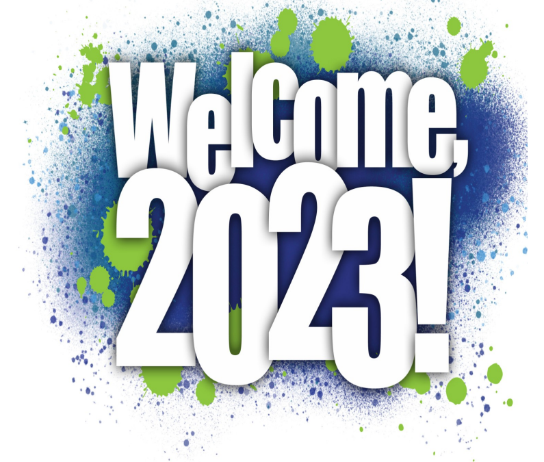 On a white background we see dark blue and light green paint blotches and the words "Welcome 2023!" in white.