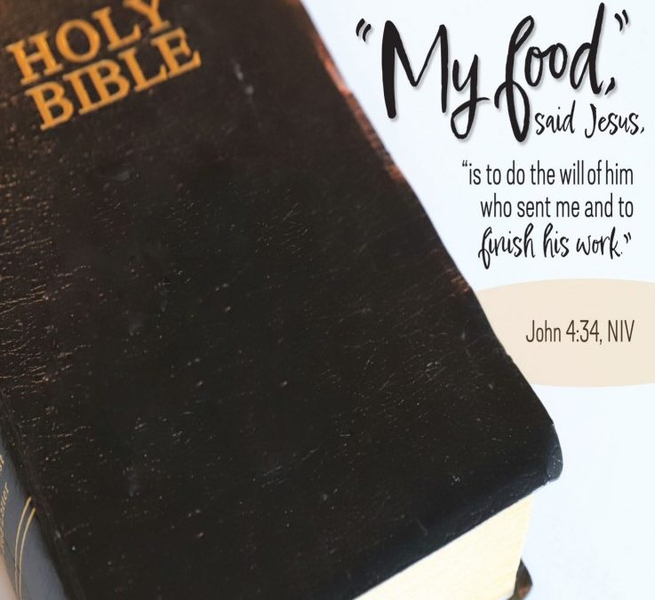 A Holy Bible. To the right of it are the words of John 4, verse 34—"My food is to do the will of Him who sent me and to accomplish His work."