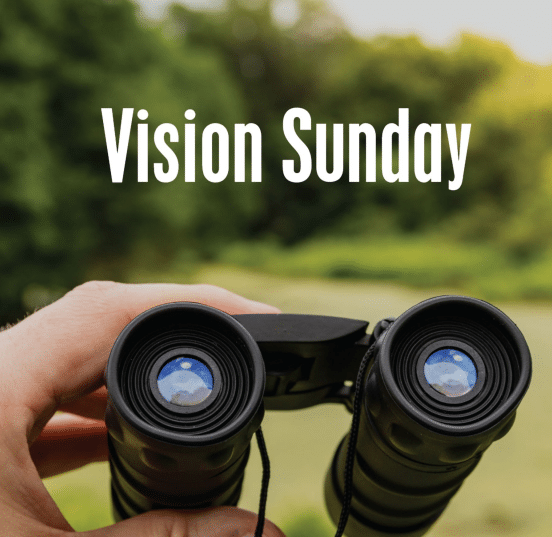 A hand holding a set of binoculars. In the distance beyond is a field and forest. Large white text above the binoculars reads "Vision Sunday."